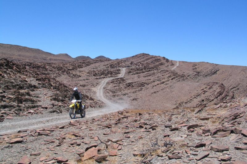 nambibia, afrika, motorrad, motorradreisen, touren, gruppenreise, rundfahrten, enduro, preiswert, günstig, wüste, himba, busch, berg, Windhoek, vingerklip, Opuwo, Ovahimba, Epupa Falls, Puros, Sesfontein, Aba, Palmwag, Aba Huab, Swakopmund, Rooiklip, Walv